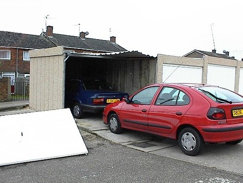 Leofric concrete garage survives the impact of a Lorry