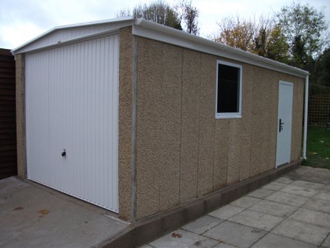 fairford Concrete garage with Interlocking concrete panels side-on